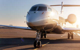 A private jet, waiting on the runway for departure